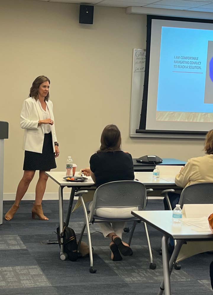 Bethany Colaprete giving a presentation